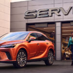 A vehicle in front of the service bay for LexusCare