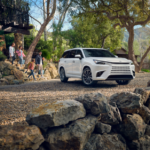 Family standing near the 2026 Lexus TX