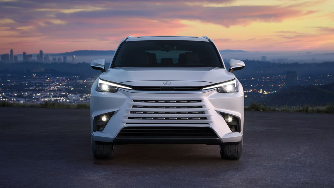 A new Lexus model parked against a sunset