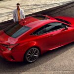 Couple walking near the Lexus RC 350